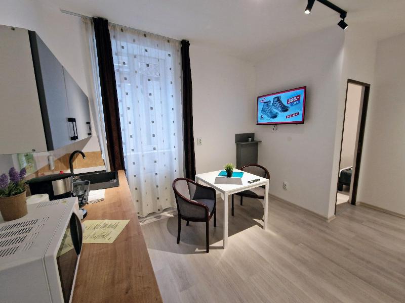 Main Square Apartments & More image