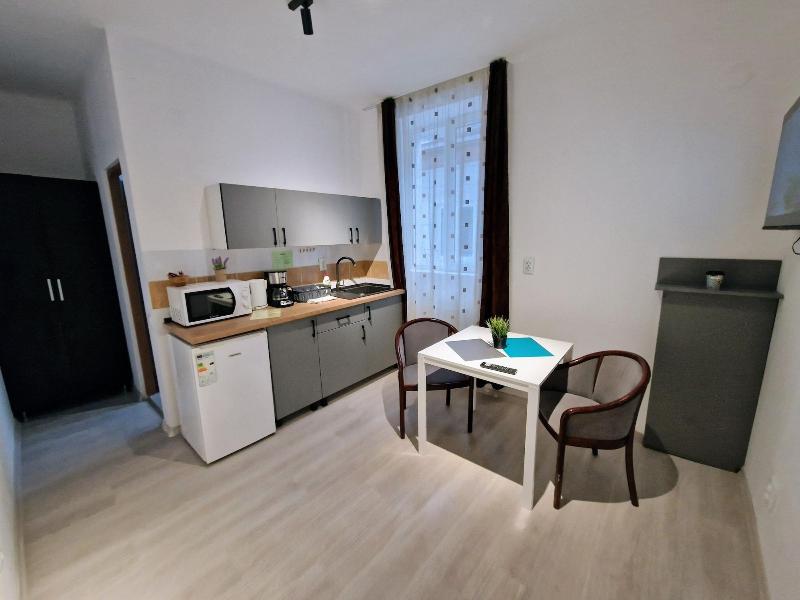 Main Square Apartments & More image