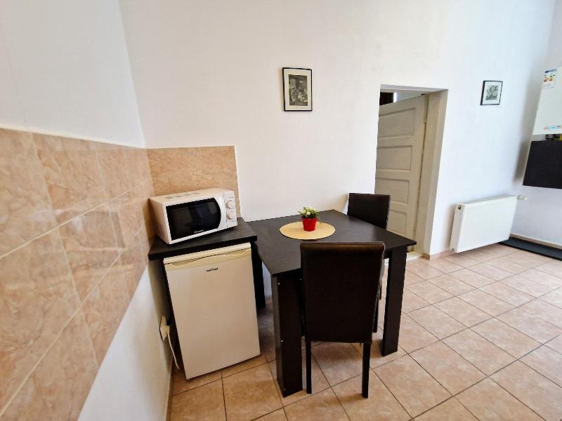 Main Square Apartments & More image