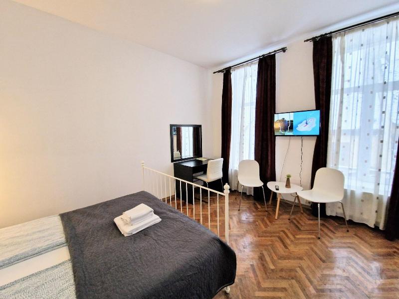 Main Square Apartments & More image