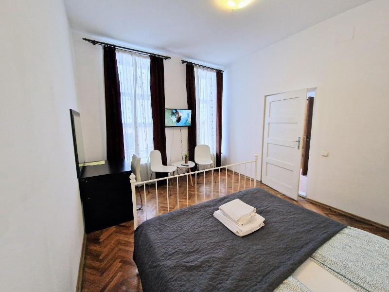 Main Square Apartments & More image