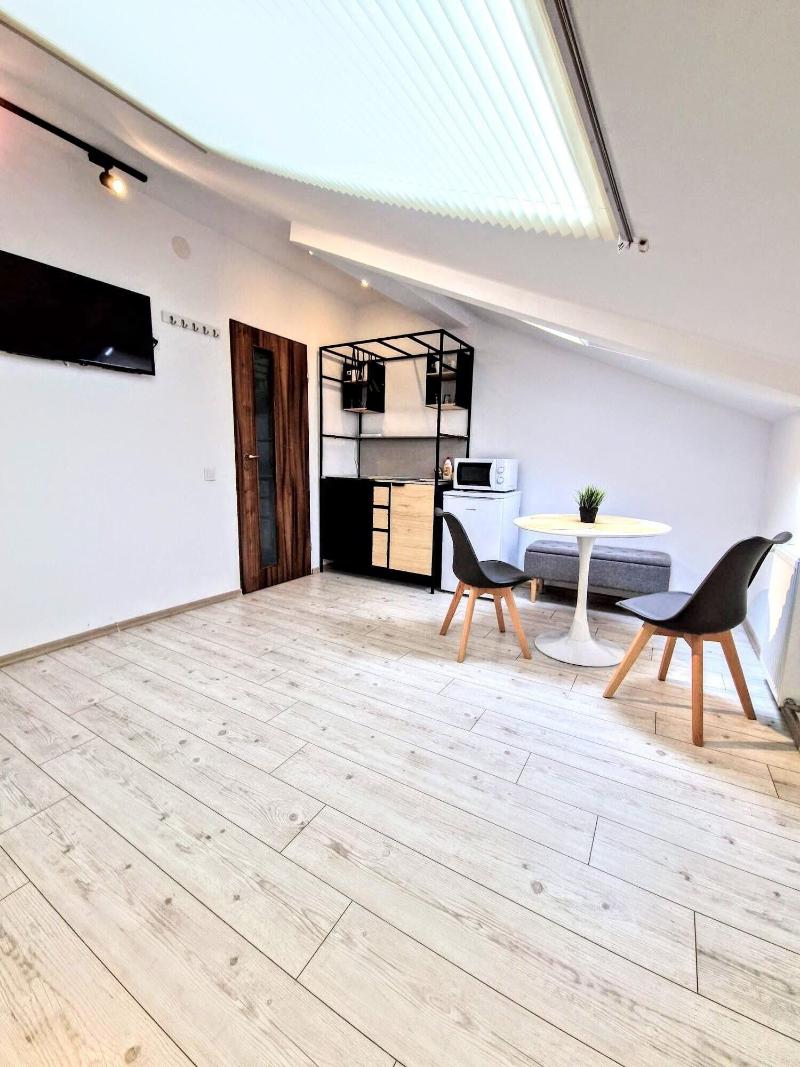 Main Square Apartments & More image