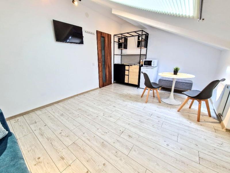 Main Square Apartments & More image