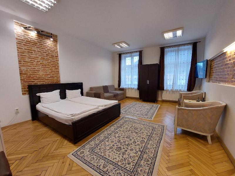 Main Square Apartments & More image