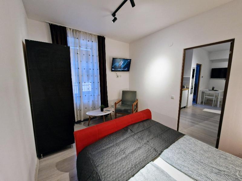 Main Square Apartments & More image