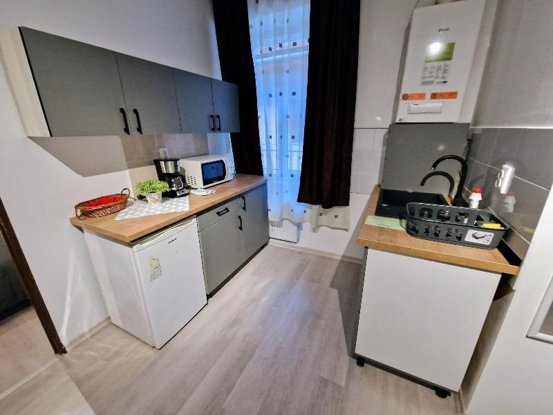 Main Square Apartments & More image