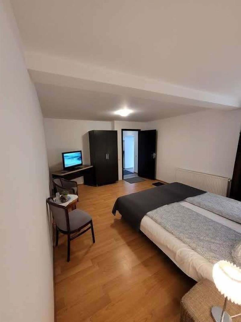Main Square Apartments & More image