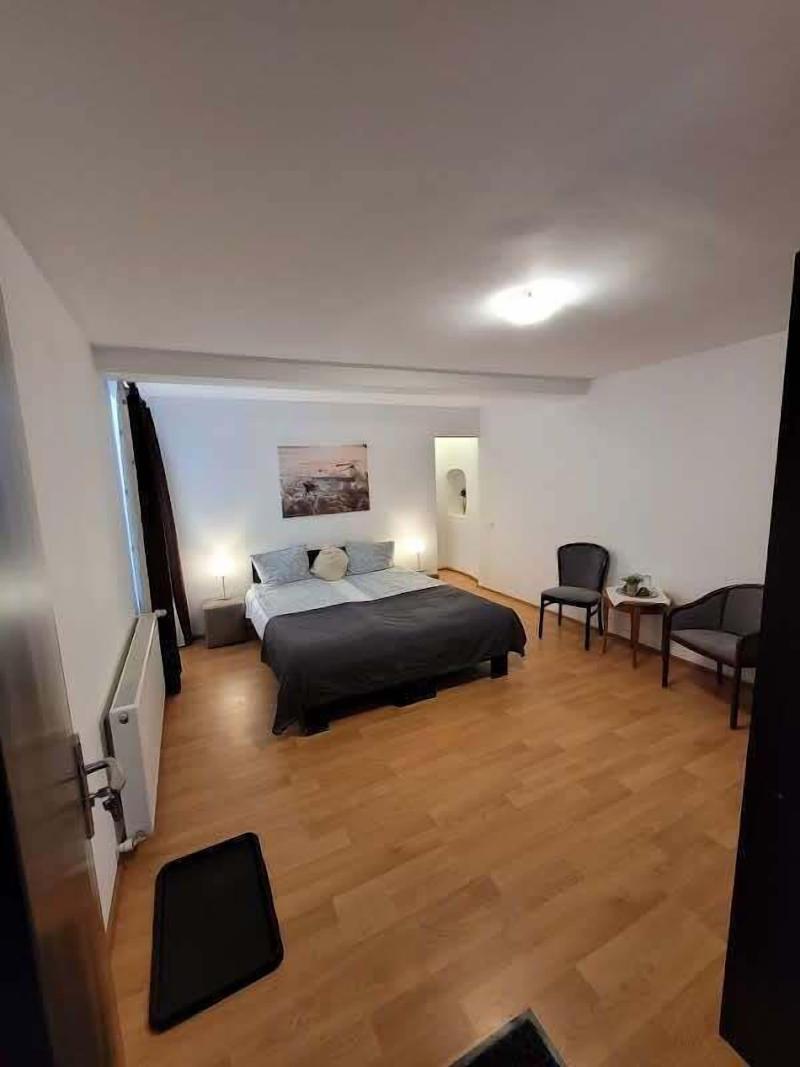 Main Square Apartments & More image