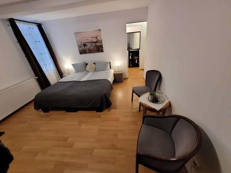 Main Square Apartments & More image
