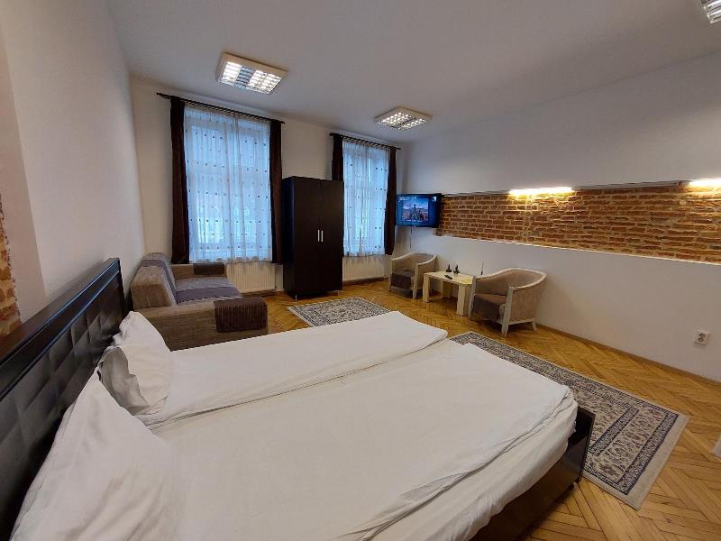 Main Square Apartments & More image