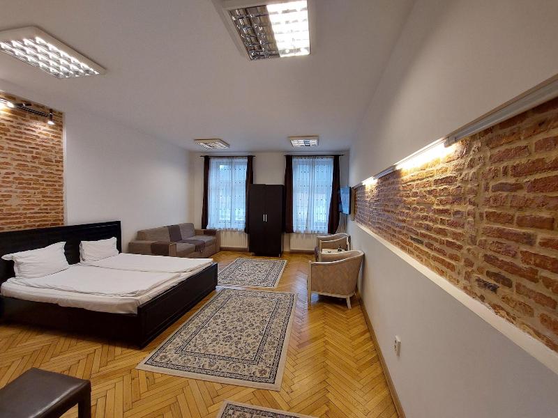 Main Square Apartments & More image