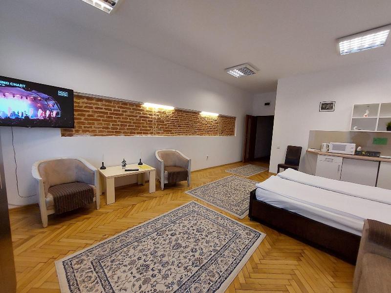 Main Square Apartments & More image