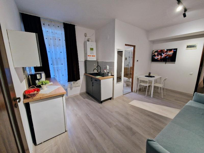 Main Square Apartments & More image