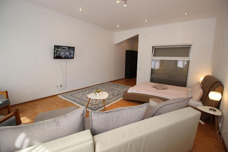 Main Square Apartments & More image