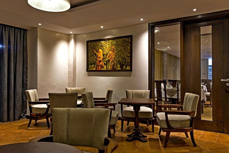 Magna Hotel And Suites image