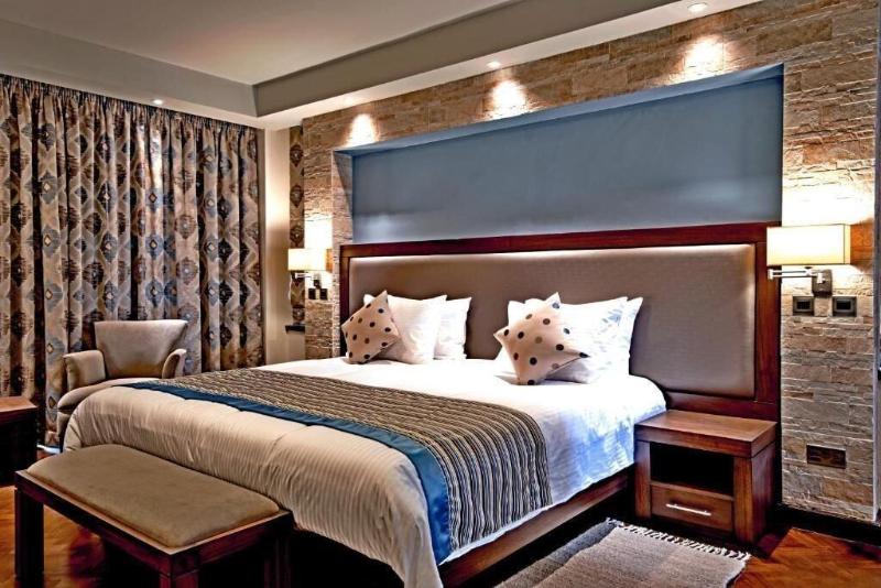 Magna Hotel And Suites image