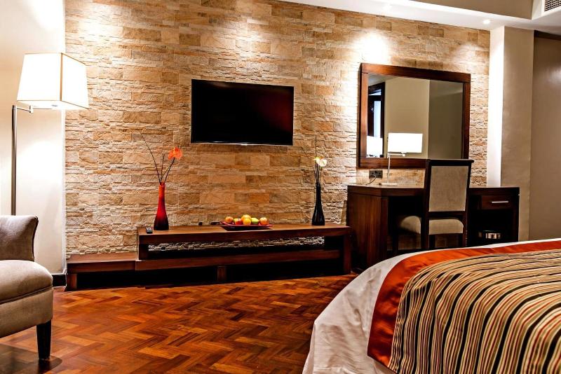 Magna Hotel And Suites image