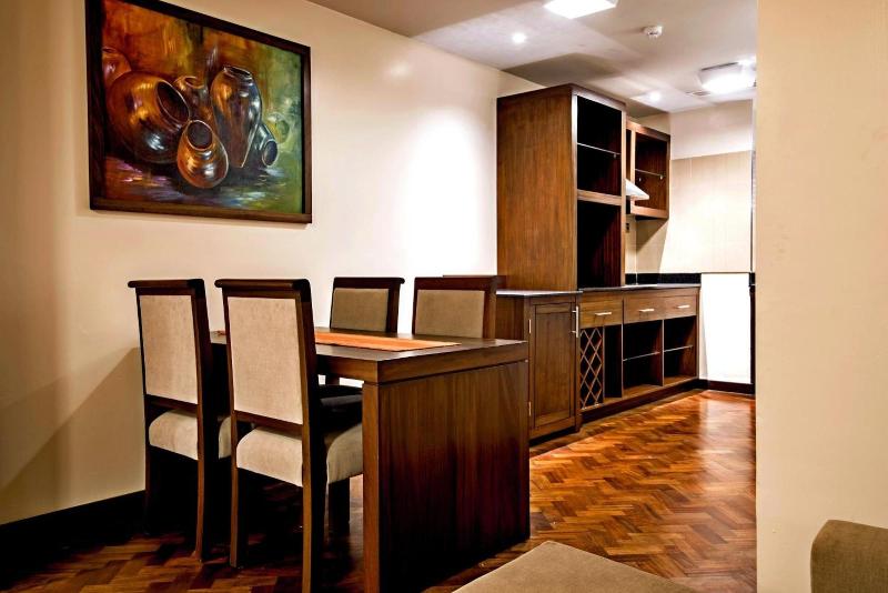 Magna Hotel And Suites image