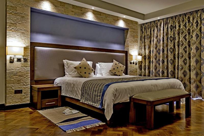 Magna Hotel And Suites image