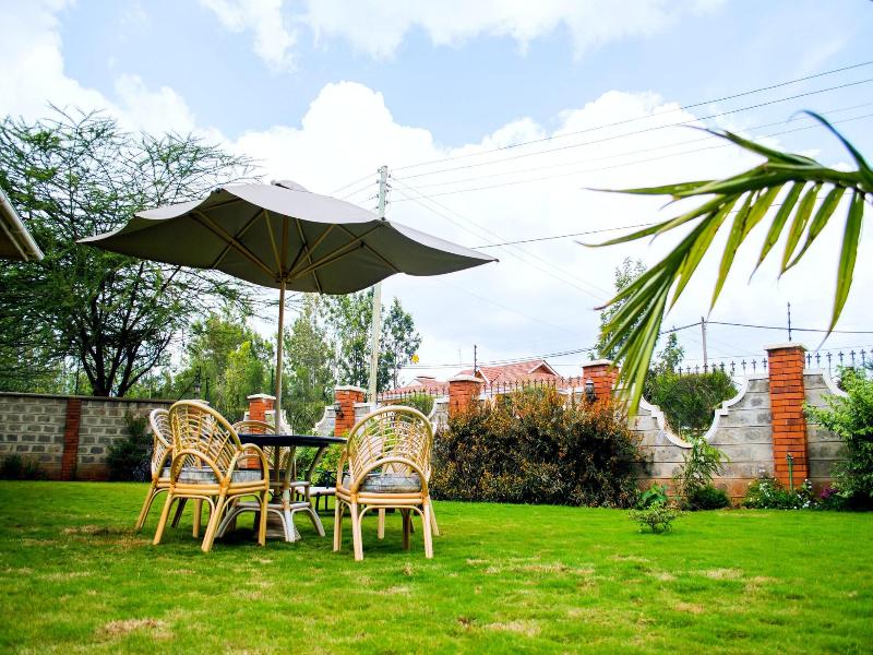 Karen Inn And Suites image