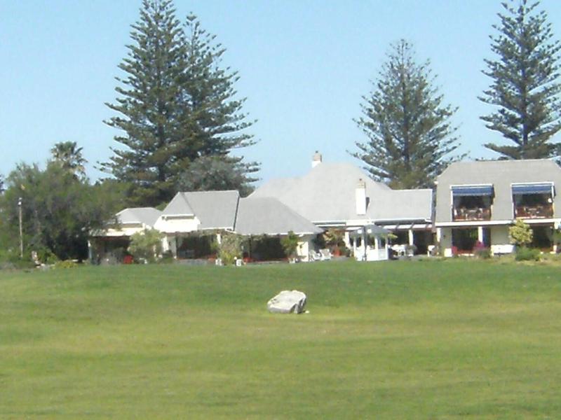Mulligans Golf Lodge image