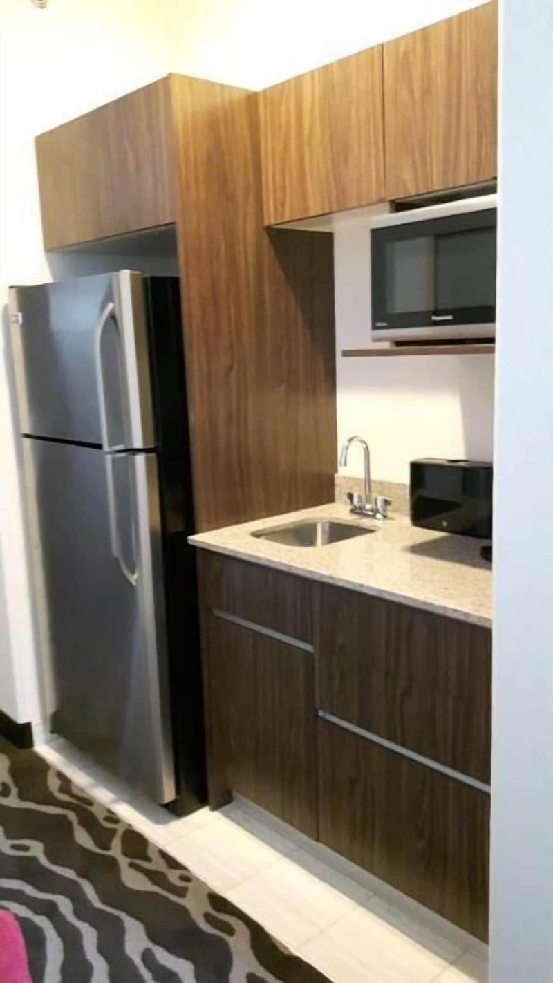 Encore Suites By Service Plus Inns image