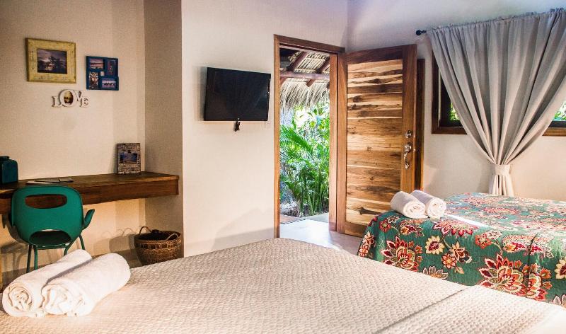 Banana Beach Bungalows image