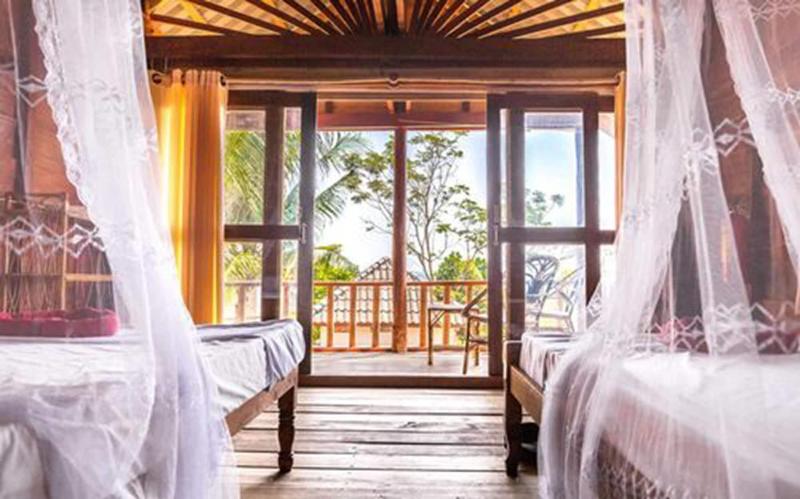 Happy Elephant Bungalows image