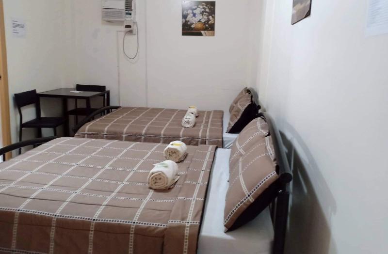 Dmc Caralos Vacation Inn And Dormitory image