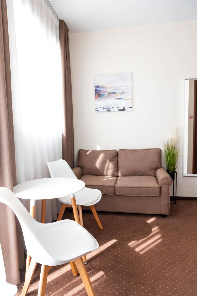 City Plaza Apartments & Rooms image