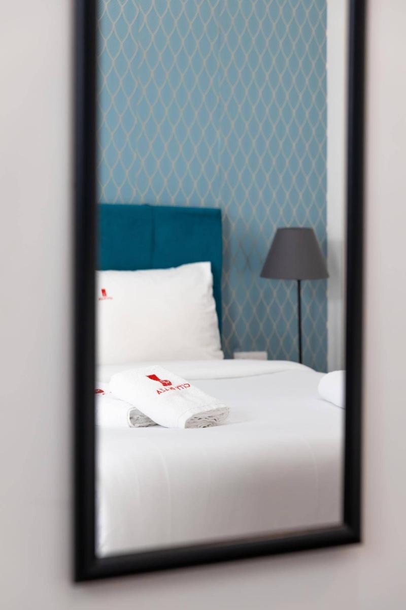City Plaza Apartments & Rooms image