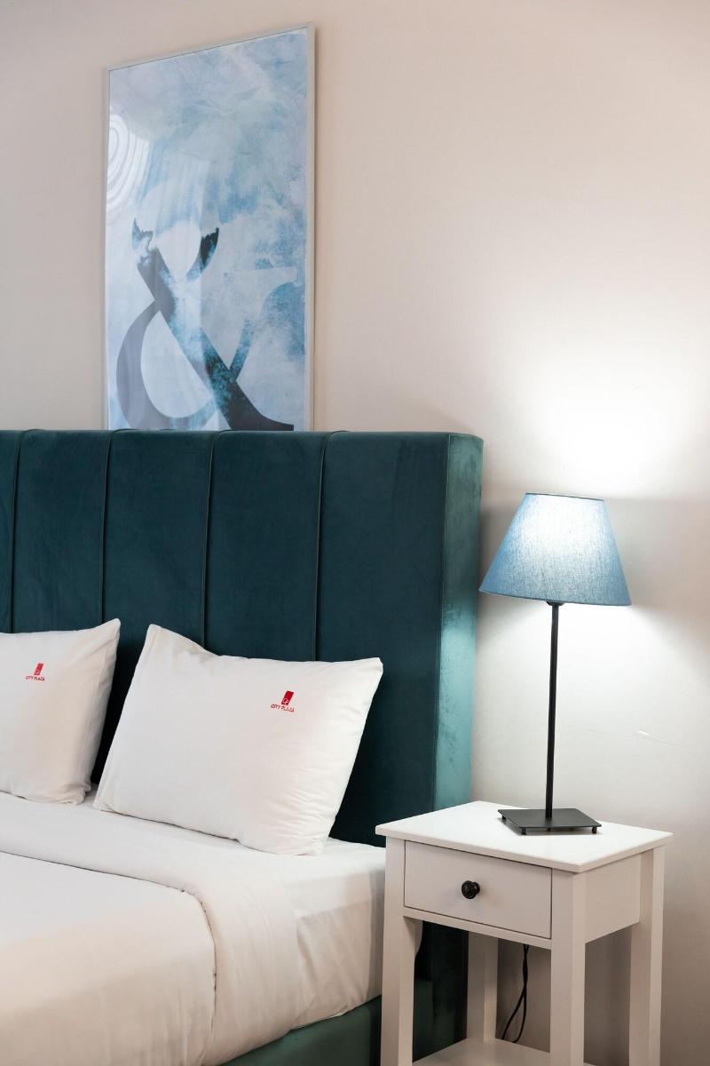 City Plaza Apartments & Rooms image