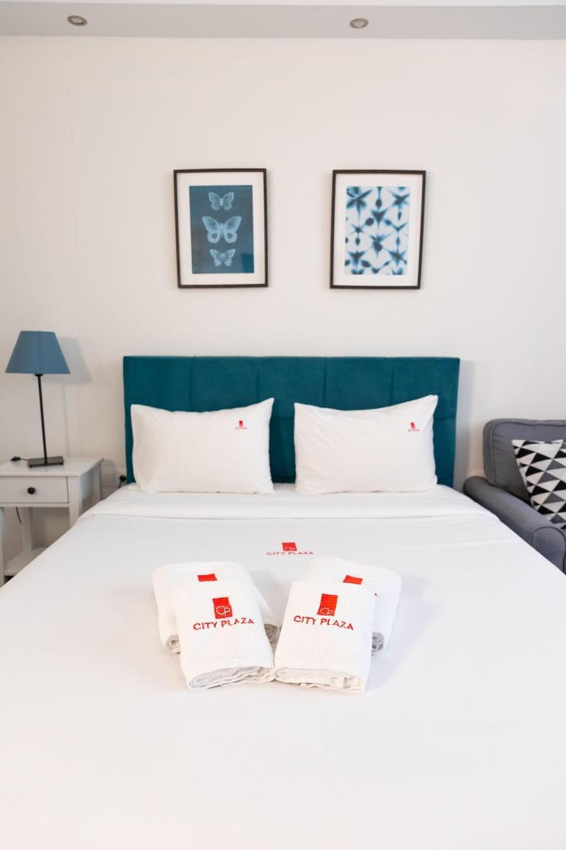 City Plaza Apartments & Rooms image