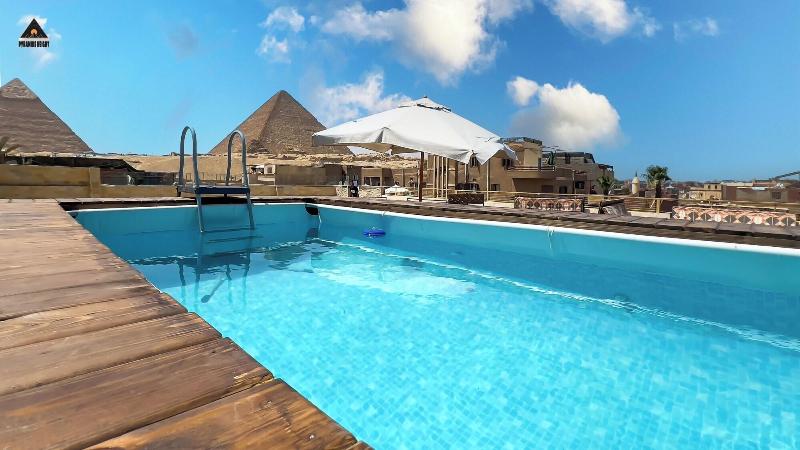 Cozy Studios Pyramids View image