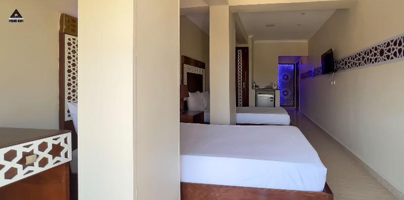 Cozy Studios Pyramids View image