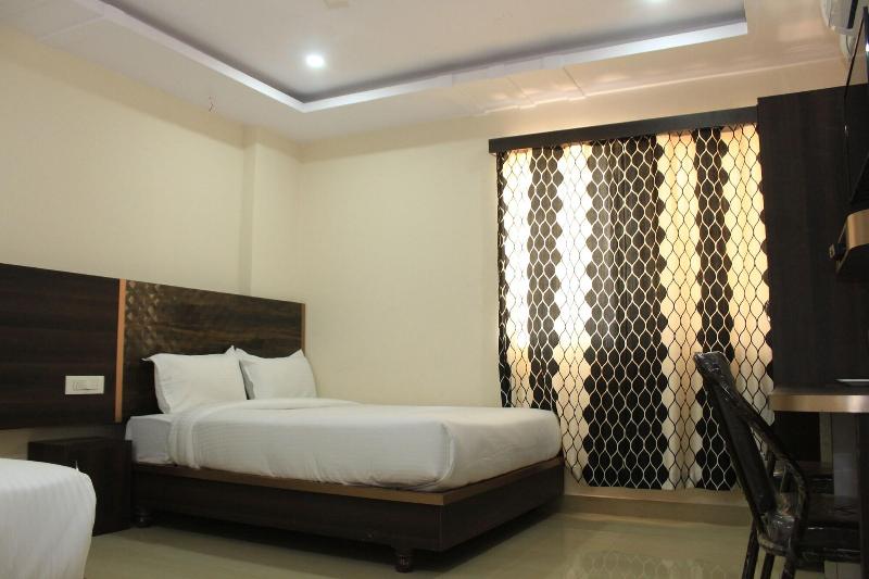 CAPITAL O75502 Hotel Asian International image