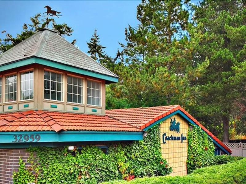 Coachman Inn & Suites image