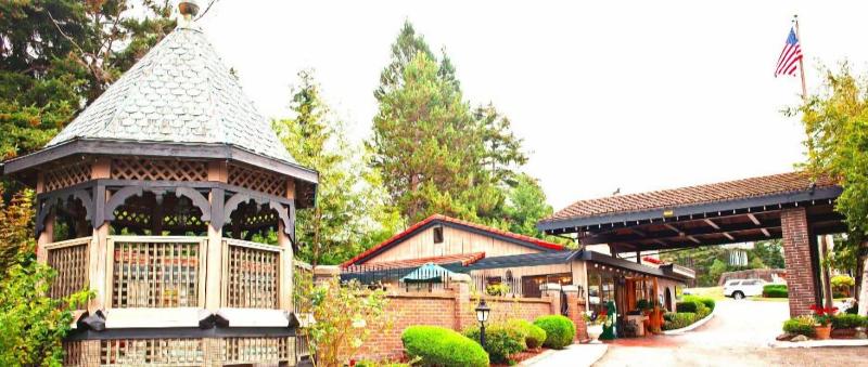 Coachman Inn & Suites image