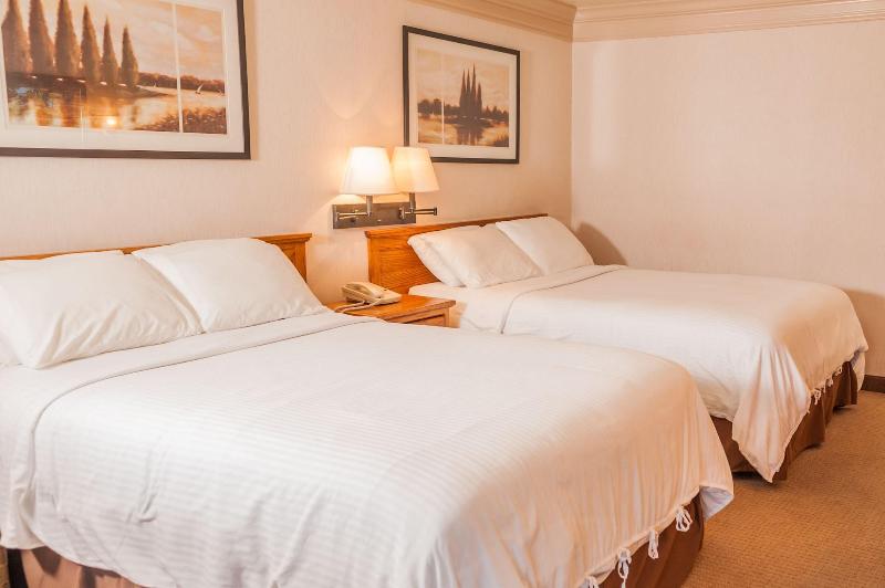 Coachman Inn & Suites image