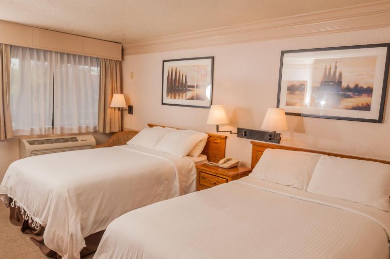 Coachman Inn & Suites image