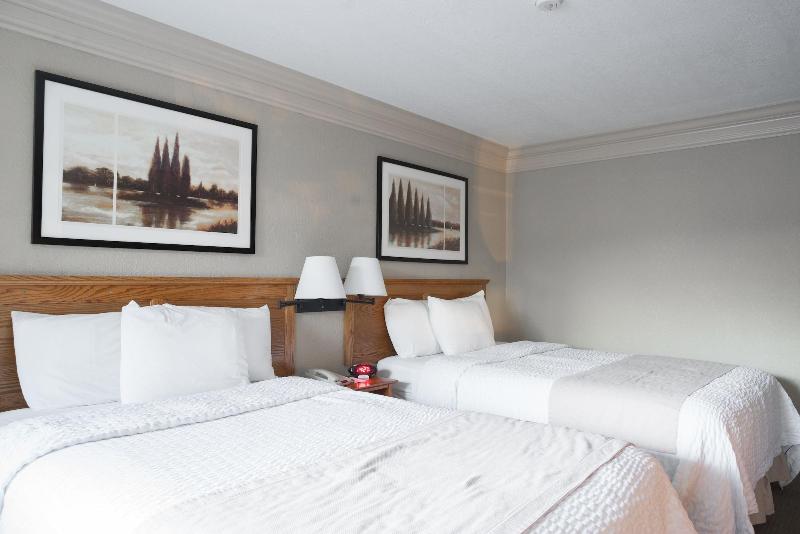 Coachman Inn & Suites image