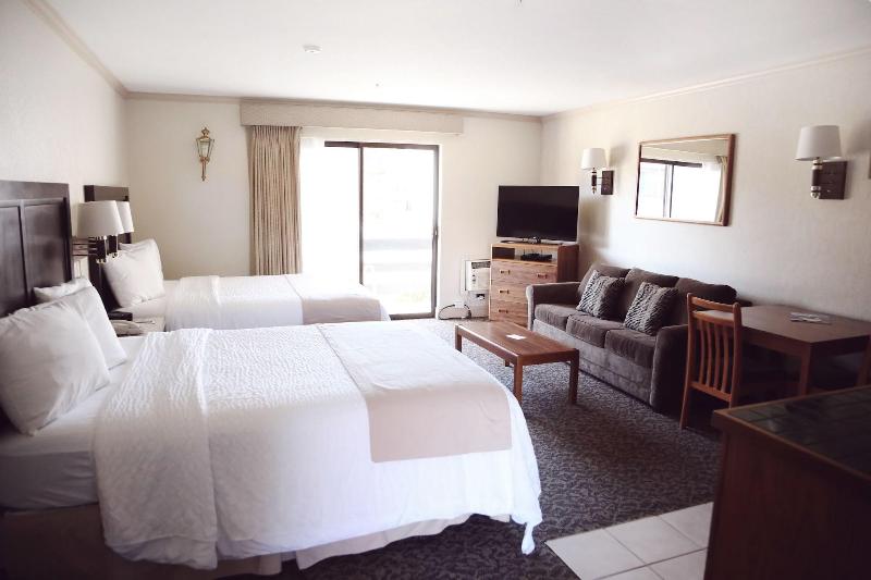 Coachman Inn & Suites image