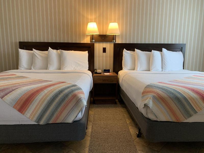 Coachman Inn & Suites image