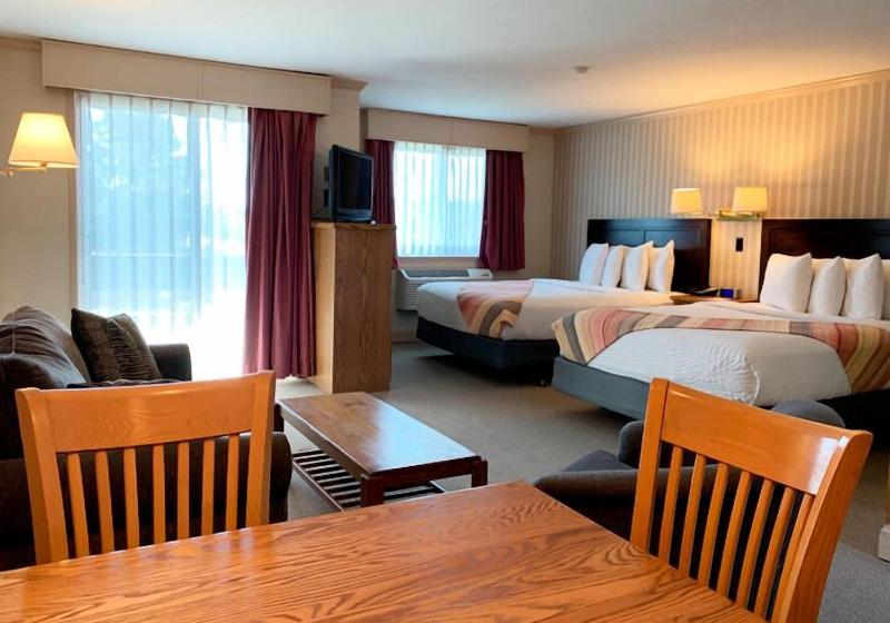 Coachman Inn & Suites image