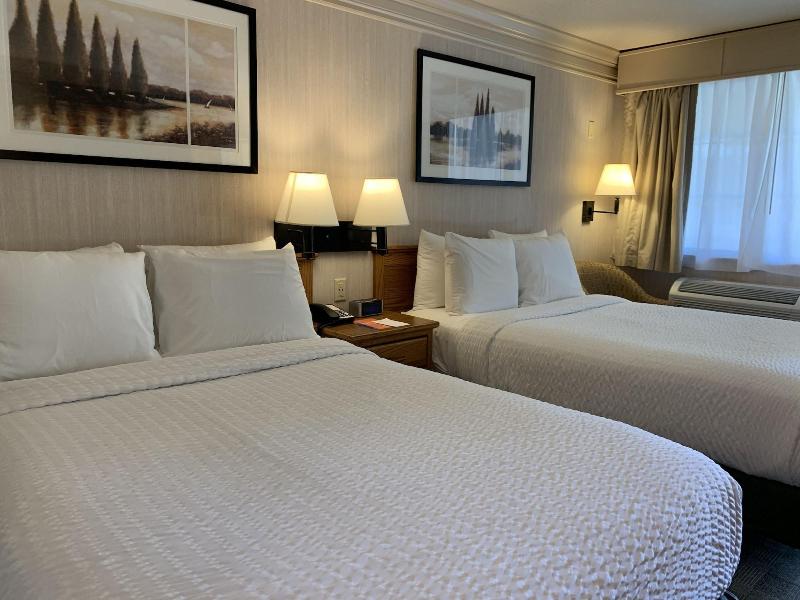 Coachman Inn & Suites image