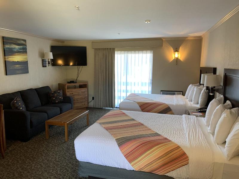 Coachman Inn & Suites image