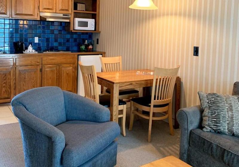 Coachman Inn & Suites image