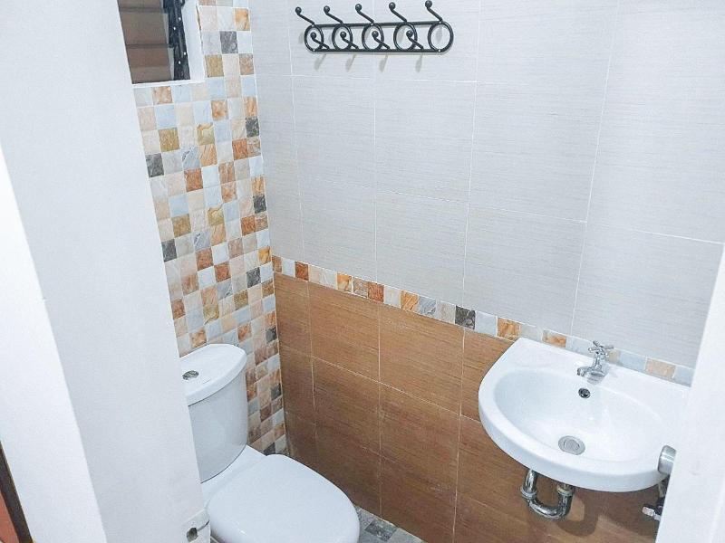 RedDoorz near SGM Condotel Villa Beach Iloilo image