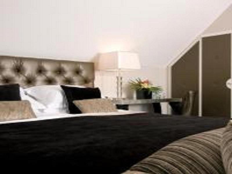 Karma Sanctum On The Green Hotel image