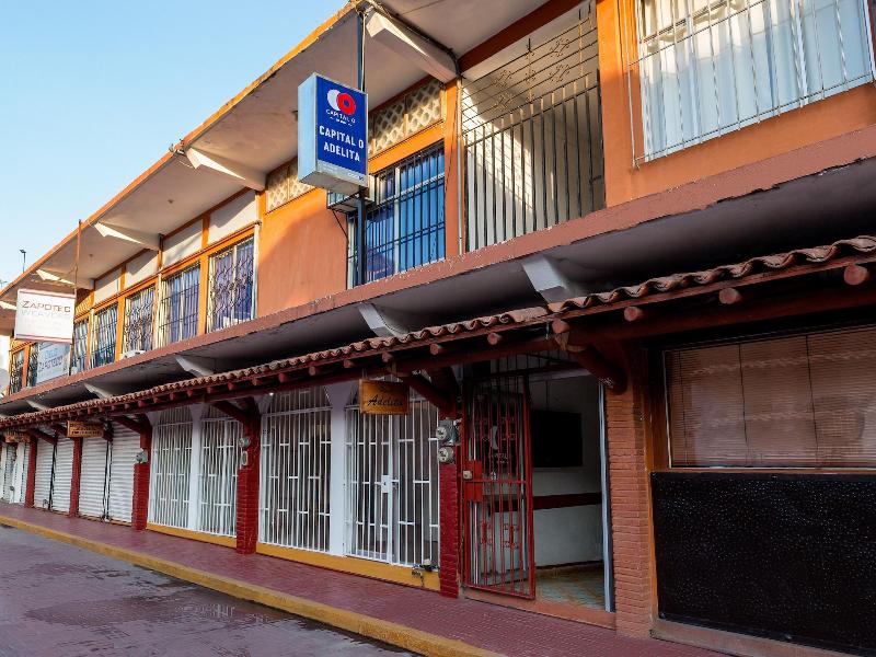 Capital O Hotel Adelita image